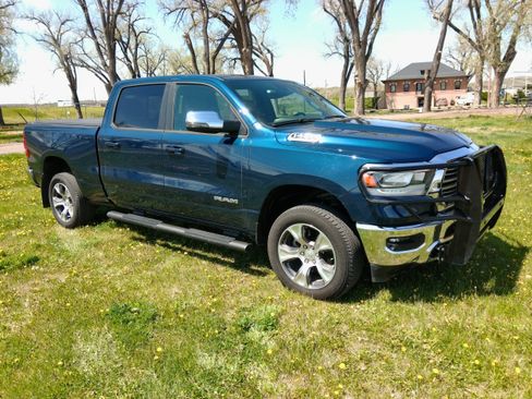 Used 2024 RAM 1500 Laramie AWD/4WD image 1