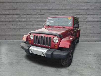Used 2012 Jeep Wrangler Unlimited Sahara w/ Dual Top Group
