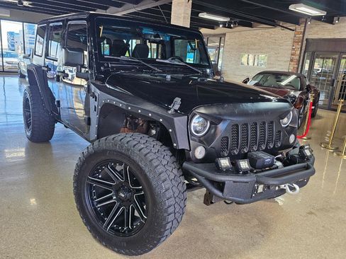 Used 2016 Jeep Wrangler Unlimited Sahara w/ Max Tow Package AWD/4WD image 1