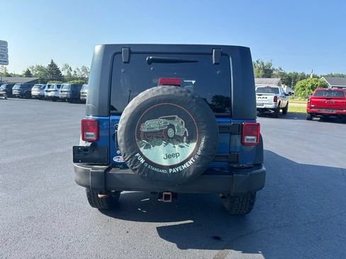 Used 2009 Jeep Wrangler Unlimited Rubicon w/ Dual Top Group AWD/4WD image 4