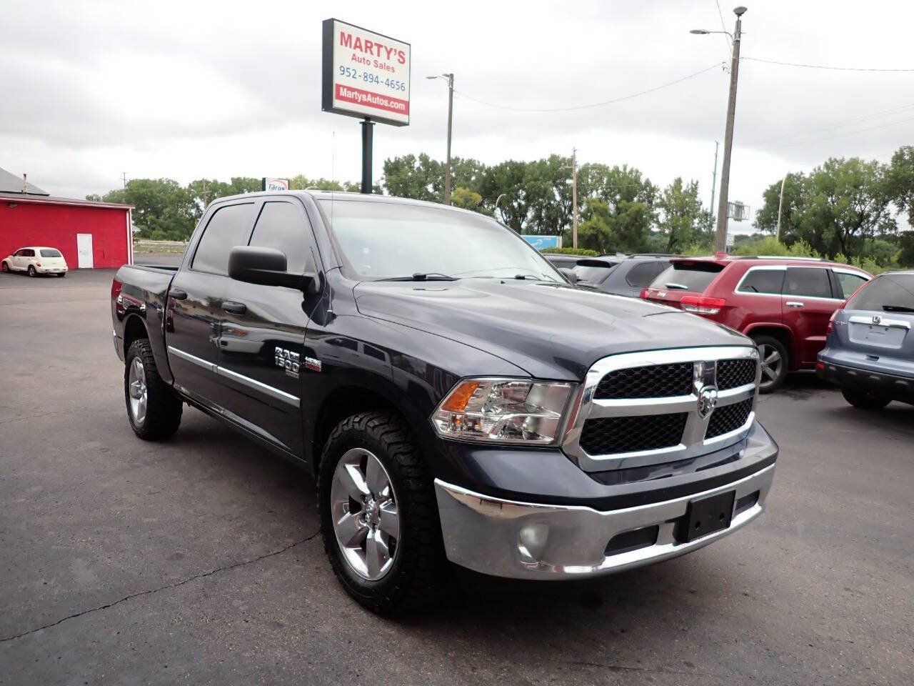 Used 2019 RAM 1500 ST w/ SXT Plus Group AWD/4WD image 1