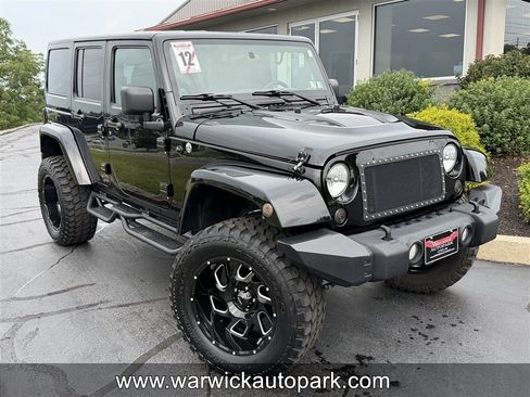 Used 2012 Jeep Wrangler Unlimited Sahara w/ Max Tow Pkg AWD/4WD image 1