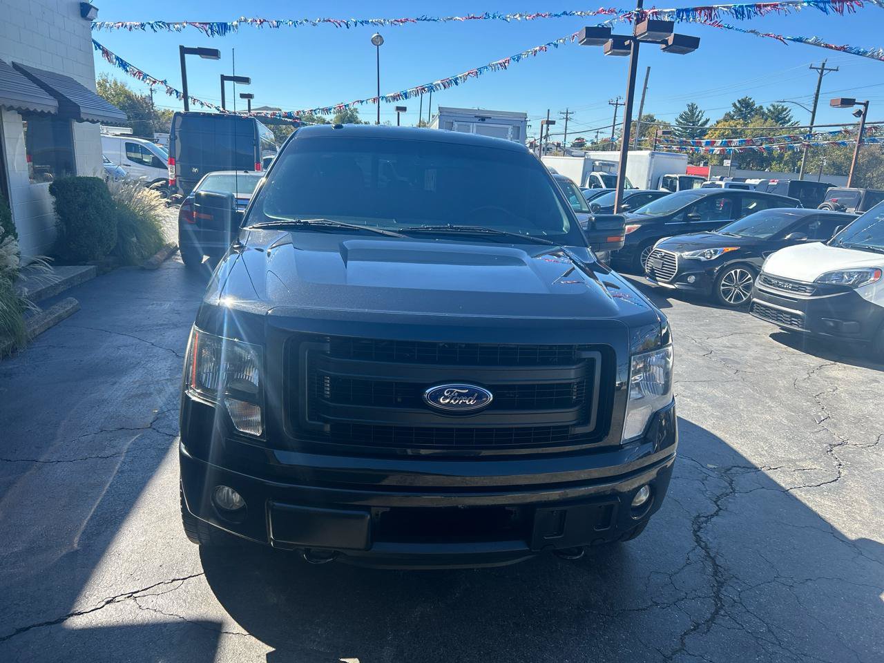 Used 2013 Ford F150 FX4 w/ Mid Equipment Group AWD/4WD image 4
