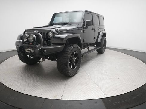 Used 2014 Jeep Wrangler Unlimited Rubicon w/ Dual Top Group AWD/4WD image 12
