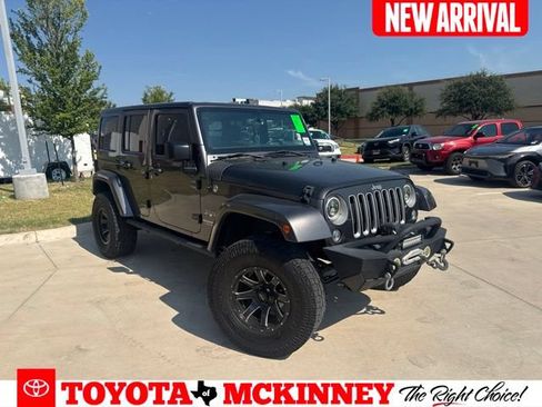 Used 2016 Jeep Wrangler Unlimited Sahara w/ Dual Top Group AWD/4WD image 1