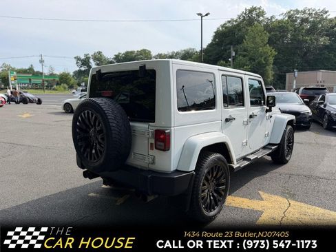 Used 2013 Jeep Wrangler Unlimited Sahara w/ Dual Top Group AWD/4WD image 11