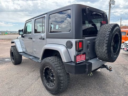 Used 2014 Jeep Wrangler Unlimited Sahara w/ Connectivity Group AWD/4WD image 4