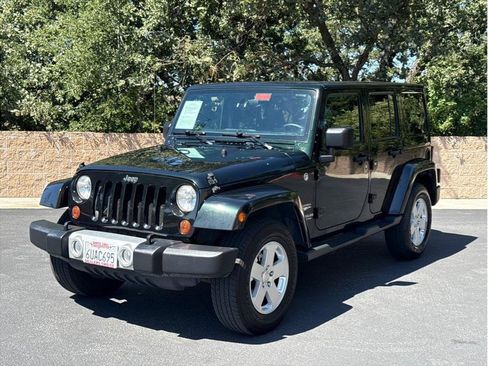 Used 2012 Jeep Wrangler Unlimited Sahara w/ Connectivity Group AWD/4WD image 1