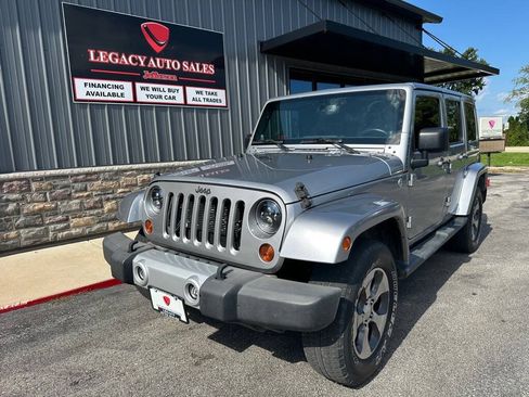 Used 2013 Jeep Wrangler Unlimited Sahara w/ Trailer Tow Group AWD/4WD image 1