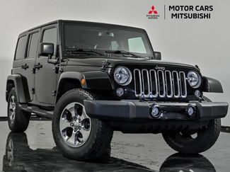Used 2016 Jeep Wrangler Unlimited Sahara w/ Connectivity Group AWD/4WD video 1