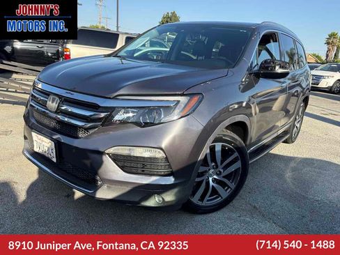 Used 2016 Honda Pilot Touring image 1