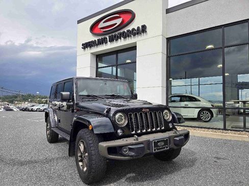 Used 2016 Jeep Wrangler Unlimited Sahara image 1