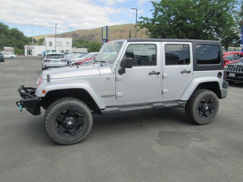 Used 2011 Jeep Wrangler Unlimited Sahara w/ Dual Top Group AWD/4WD image 1