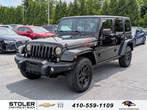 Used 2016 Jeep Wrangler Unlimited Sahara AWD/4WD image 1