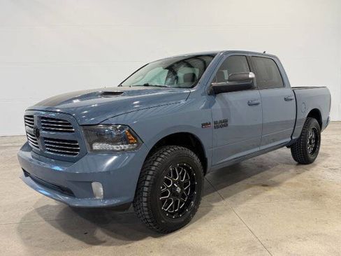 Used 2015 RAM 1500 Sport w/ Ceramic Blue Sport Package AWD/4WD image 1