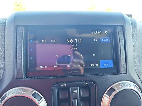 Used 2013 Jeep Wrangler Unlimited Sahara w/ Dual Top Group AWD/4WD image 22