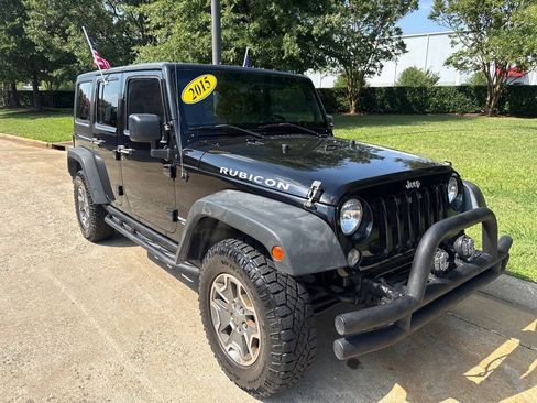 Used 2015 Jeep Wrangler Unlimited Rubicon w/ Dual Top Group AWD/4WD image 1