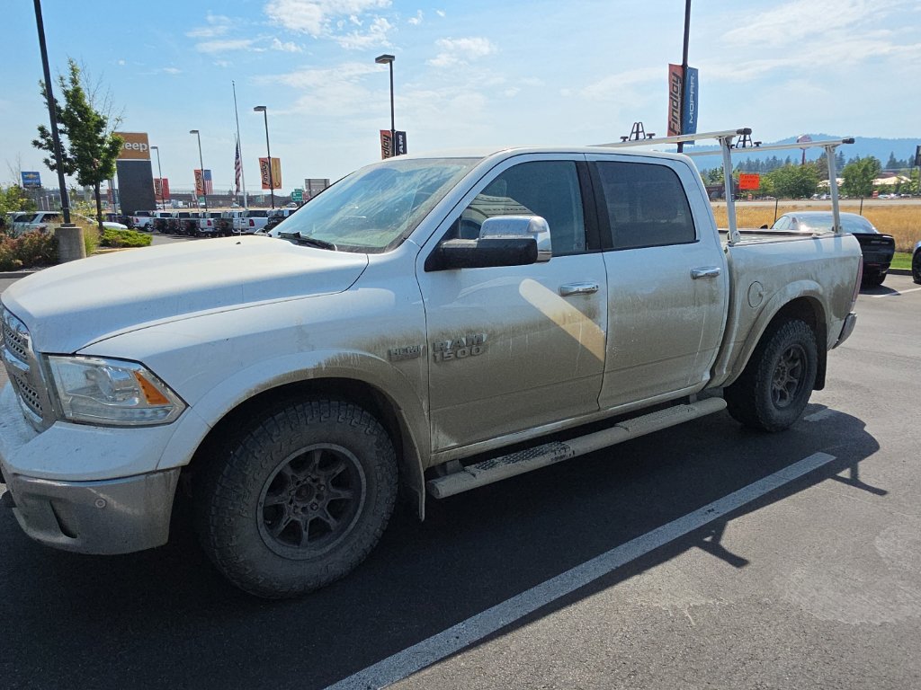 Used 2016 RAM 1500 Laramie AWD/4WD image 1