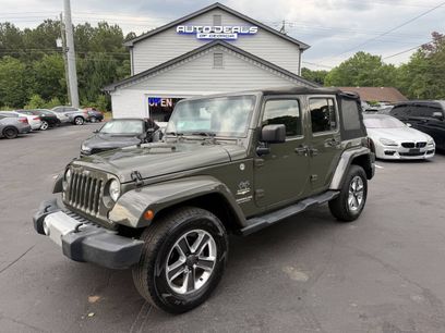 Used 2015 Jeep Wrangler Unlimited Sahara w/ Dual Top Group