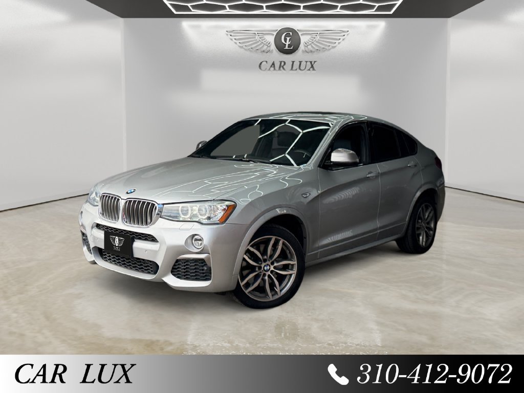 Used 2017 BMW X4 M40i w/ Technology Package AWD/4WD image 1