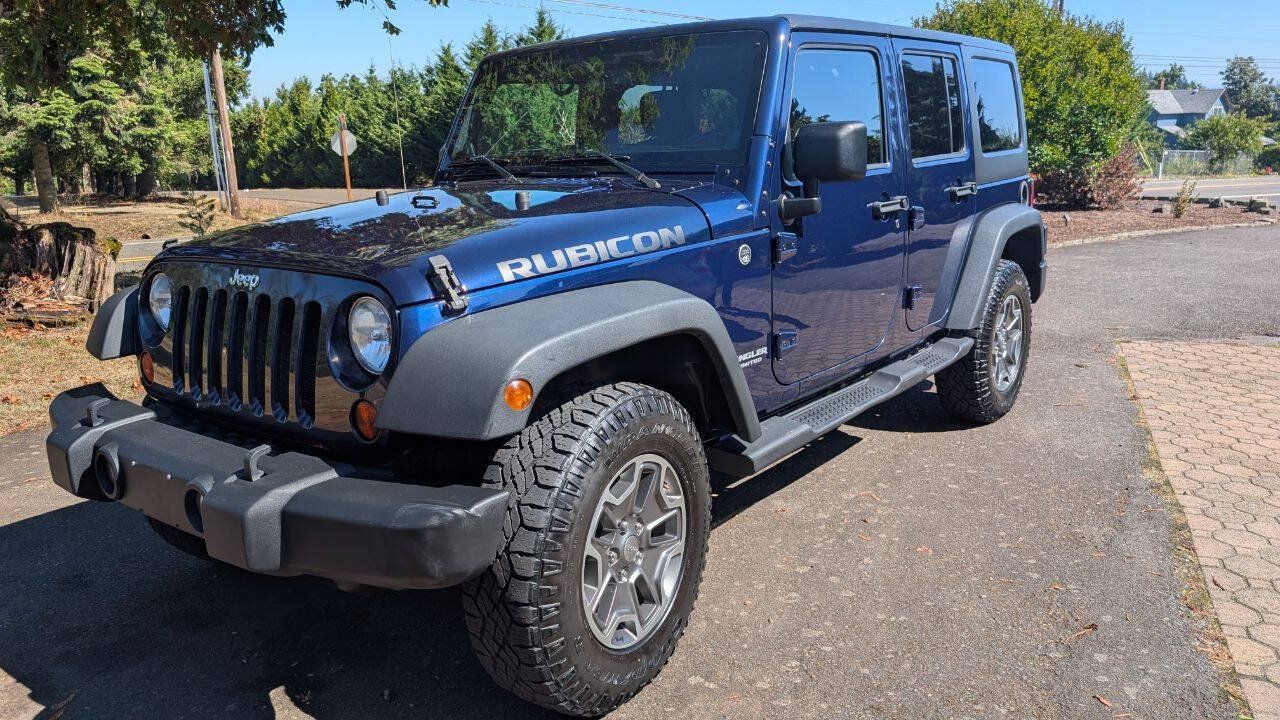 Used 2013 Jeep Wrangler Unlimited Rubicon w/ Connectivity Group AWD/4WD image 1