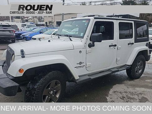Used 2013 Jeep Wrangler Unlimited Sport image 1