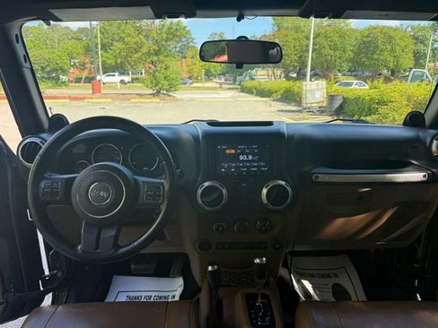 Used 2012 Jeep Wrangler Unlimited Sahara w/ Dual Top Group AWD/4WD image 10