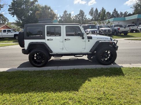 Used 2014 Jeep Wrangler Unlimited Rubicon w/ Dual Top Group AWD/4WD image 4