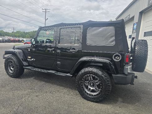 Used 2013 Jeep Wrangler Unlimited Sahara w/ Dual Top Group AWD/4WD image 3