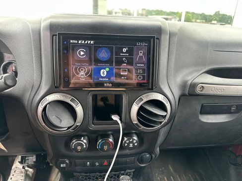 Used 2012 Jeep Wrangler Unlimited Sport w/ Dual Top Group AWD/4WD image 9