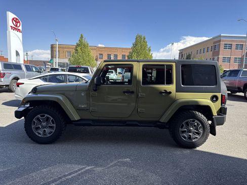 Used 2013 Jeep Wrangler Unlimited Sahara w/ Dual Top Group AWD/4WD image 6