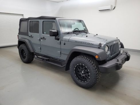 Used 2014 Jeep Wrangler Unlimited Rubicon w/ Dual Top Group AWD/4WD image 11