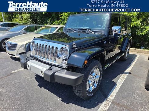 Used 2014 Jeep Wrangler Unlimited Sahara w/ Dual Top Group AWD/4WD image 1
