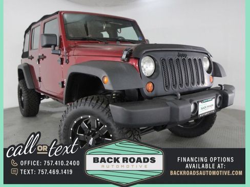Used 2013 Jeep Wrangler Unlimited Sport w/ Trailer Tow Group AWD/4WD image 1