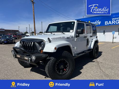 Used 2013 Jeep Wrangler Unlimited Sahara w/ Dual Top Group image 1