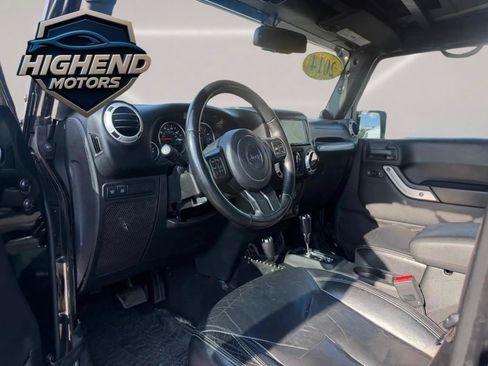 Used 2014 Jeep Wrangler Unlimited Rubicon w/ Dual Top Group AWD/4WD image 12