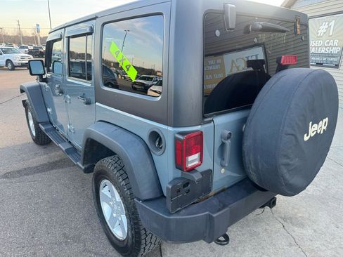 Used 2014 Jeep Wrangler Unlimited Sport w/ Dual Top Group AWD/4WD image 7