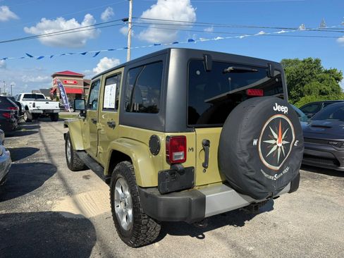 Used 2013 Jeep Wrangler Unlimited Sahara w/ Dual Top Group AWD/4WD image 4