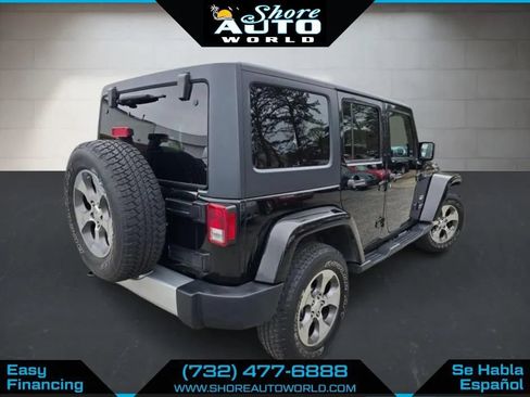 Used 2014 Jeep Wrangler Unlimited Sahara w/ Dual Top Group AWD/4WD image 5