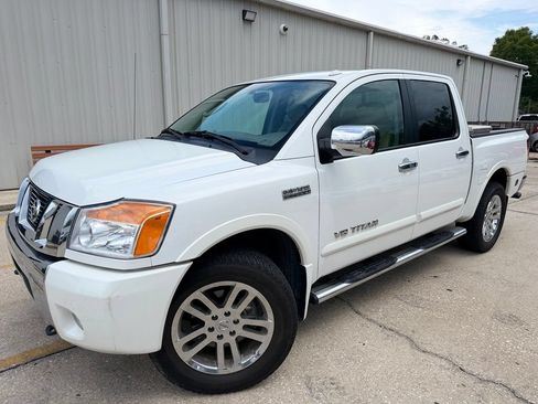 Used 2011 Nissan Titan SL w/ Heavy Metal Edition Pkg AWD/4WD image 1