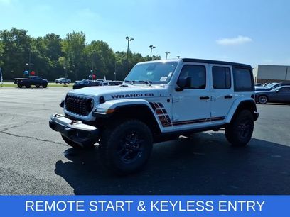 New 2026 Jeep Wrangler Unlimited Sport w/ Dual Top Group