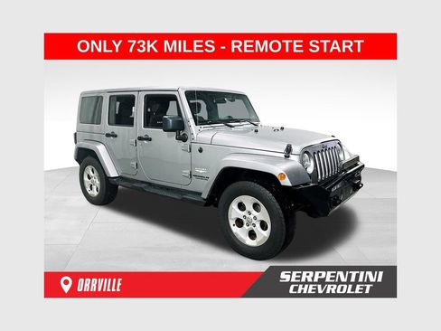 Used 2014 Jeep Wrangler Unlimited Sahara w/ Dual Top Group AWD/4WD image 1