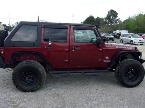 Used 2010 Jeep Wrangler Unlimited Rubicon w/ Dual Top Group image 8