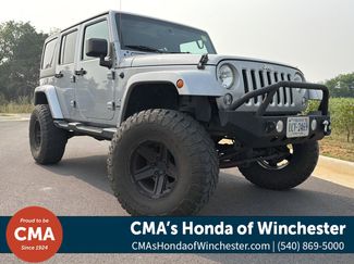 Used 2016 Jeep Wrangler Unlimited Sahara w/ Max Tow Package AWD/4WD video 1