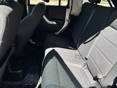 Used 2012 Jeep Wrangler Unlimited Rubicon w/ Dual Top Group image 11