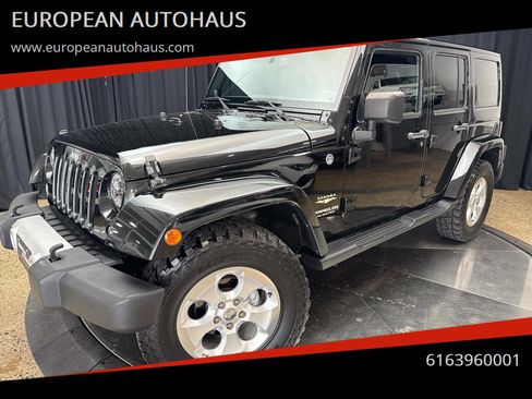Used 2014 Jeep Wrangler Unlimited Sahara w/ Dual Top Group image 1