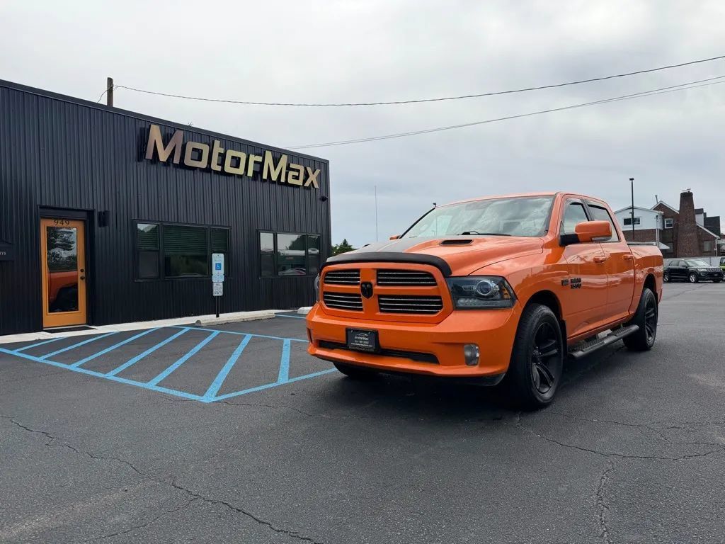 Used 2017 RAM 1500 Sport w/ Ignition Orange Sport Package AWD/4WD image 1