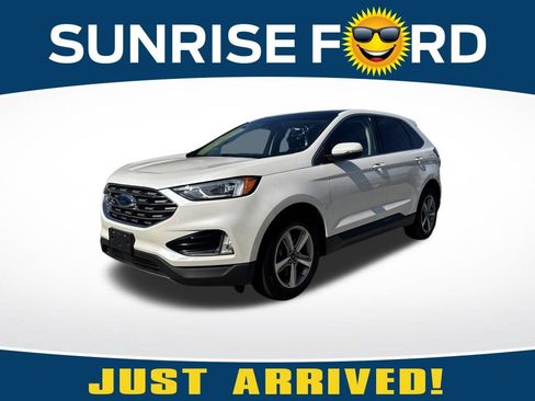 Used 2019 Ford Edge Titanium w/ Cold Weather Package AWD/4WD image 1