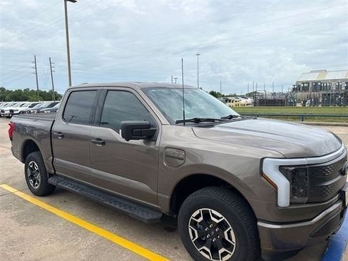 Used 2023 Ford F150 Lightning XLT AWD/4WD image 1
