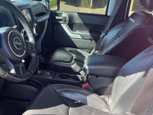 Used 2013 Jeep Wrangler Unlimited Sahara w/ Dual Top Group AWD/4WD image 13